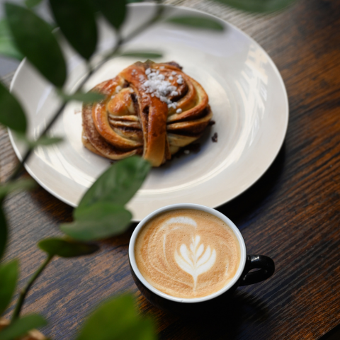 Kanelbullar with cup of coffee